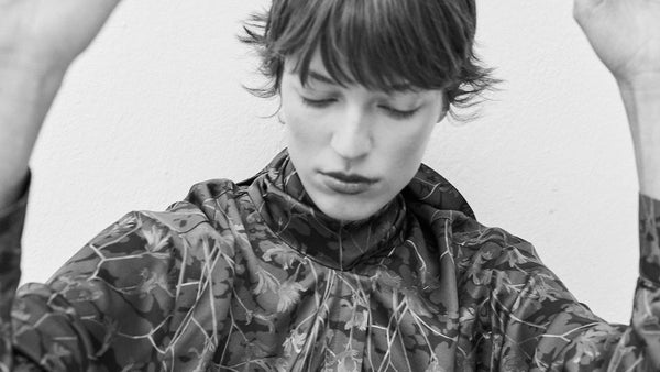 Archive 0.1 botanical print set. Fluid top with structural neck draping and relaxed trousers. Custom made tailoring.